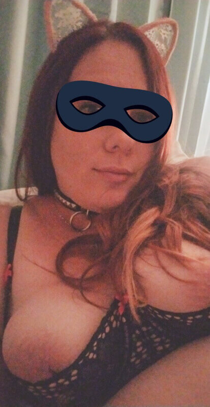 Lindset Knott wearing cat eyes with her boobs out and a mask filter over her eyes